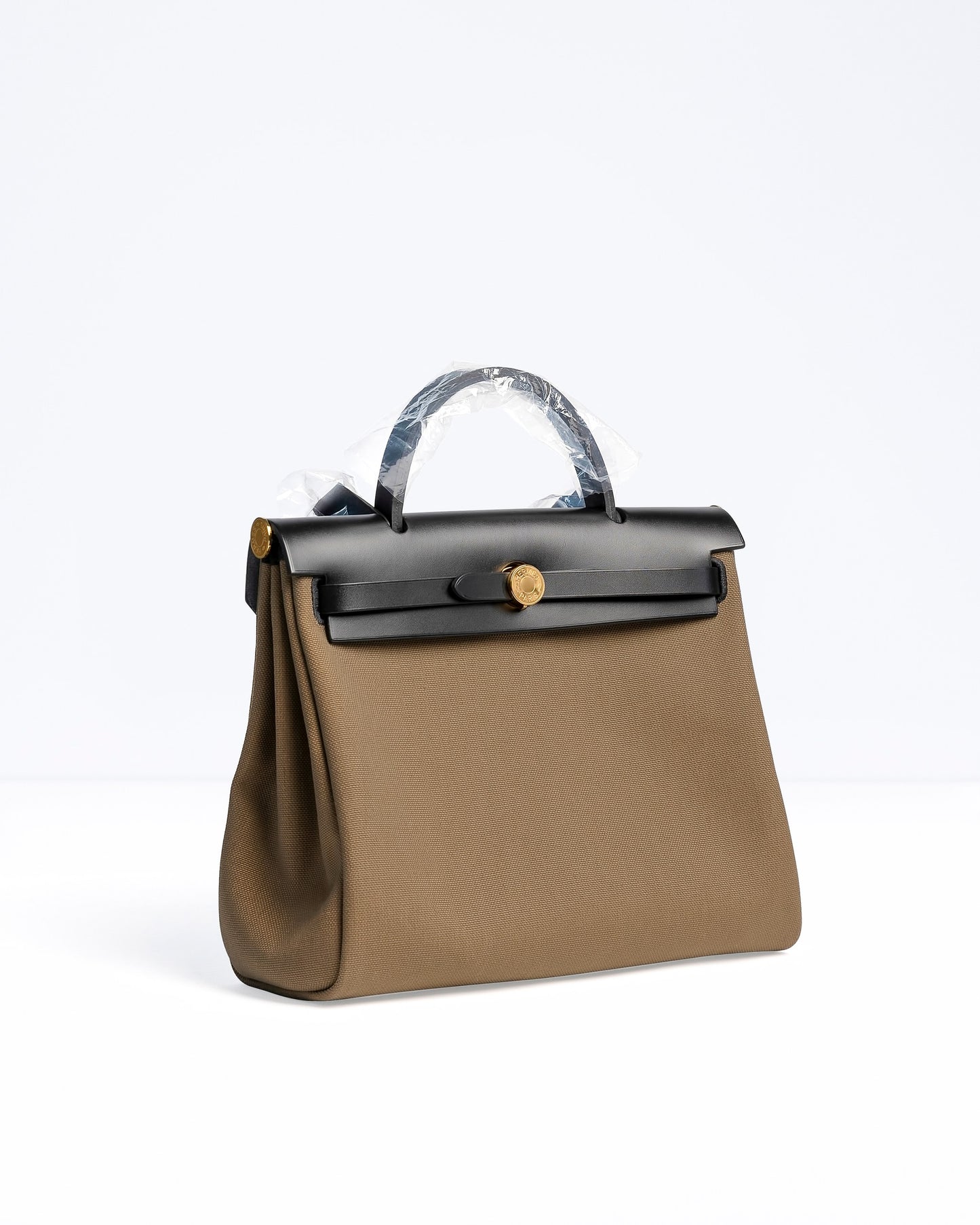 Herbag Zip 31 Toundra/Noir Vache Hunter and Toile with Gold Hardware