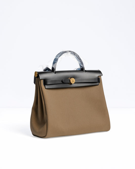 Herbag Zip 31 Toundra/Noir Vache Hunter and Toile with Gold Hardware