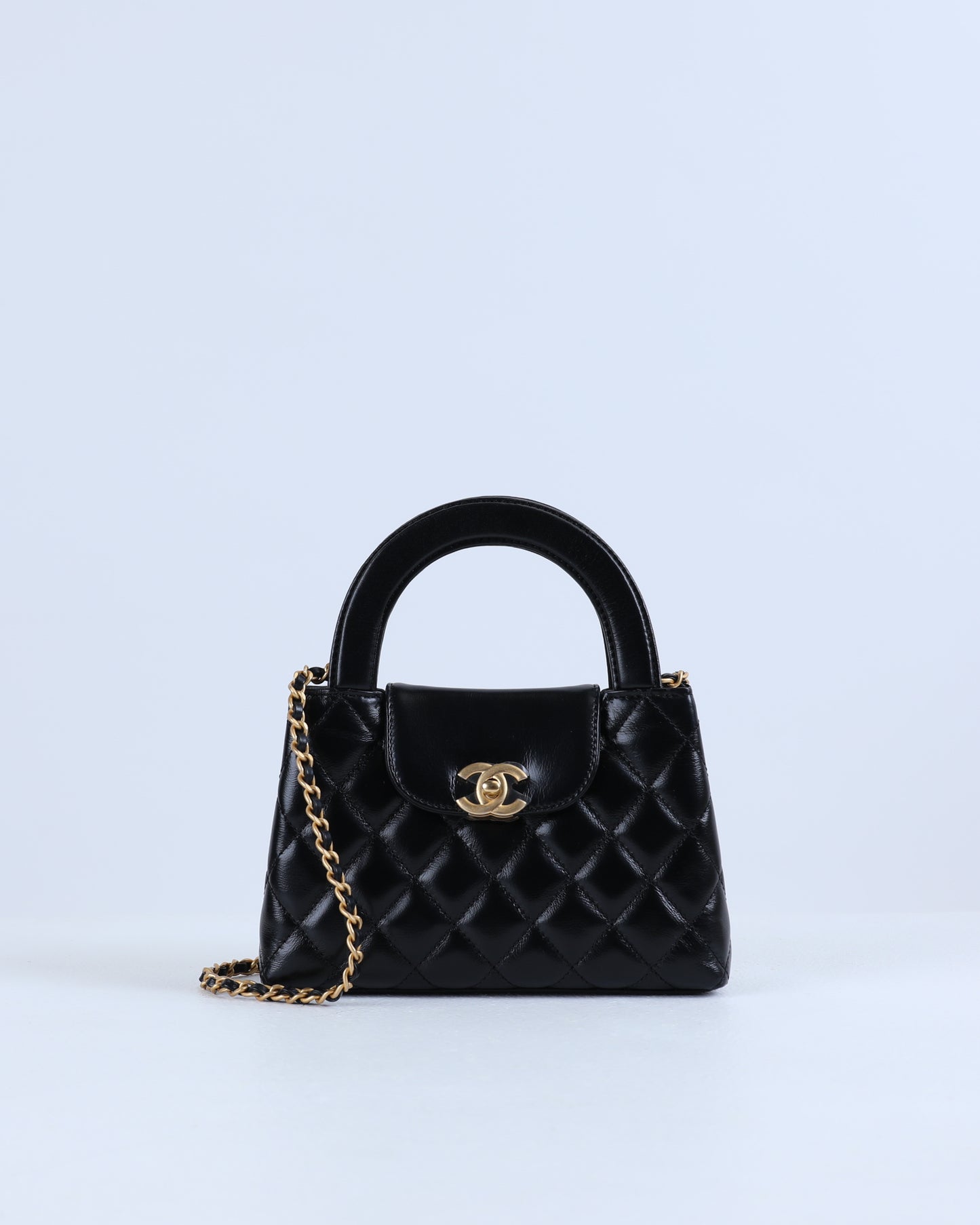 Chanel Kelly Bag Shiny Aged Calfskin & Gold-Tone Metal in Black Medium size