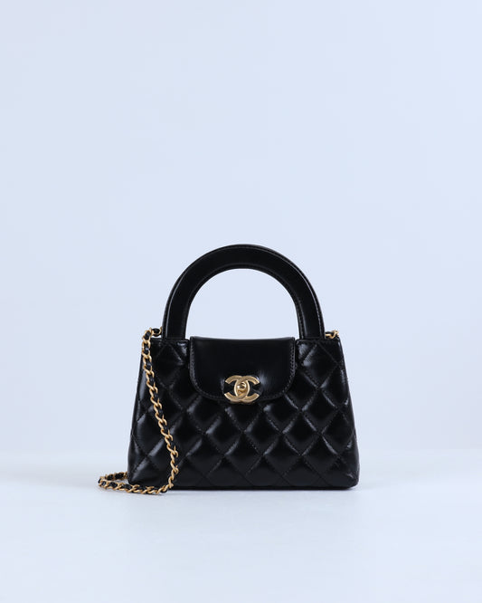 Chanel Kelly Bag Shiny Aged Calfskin & Gold-Tone Metal in Black Medium size