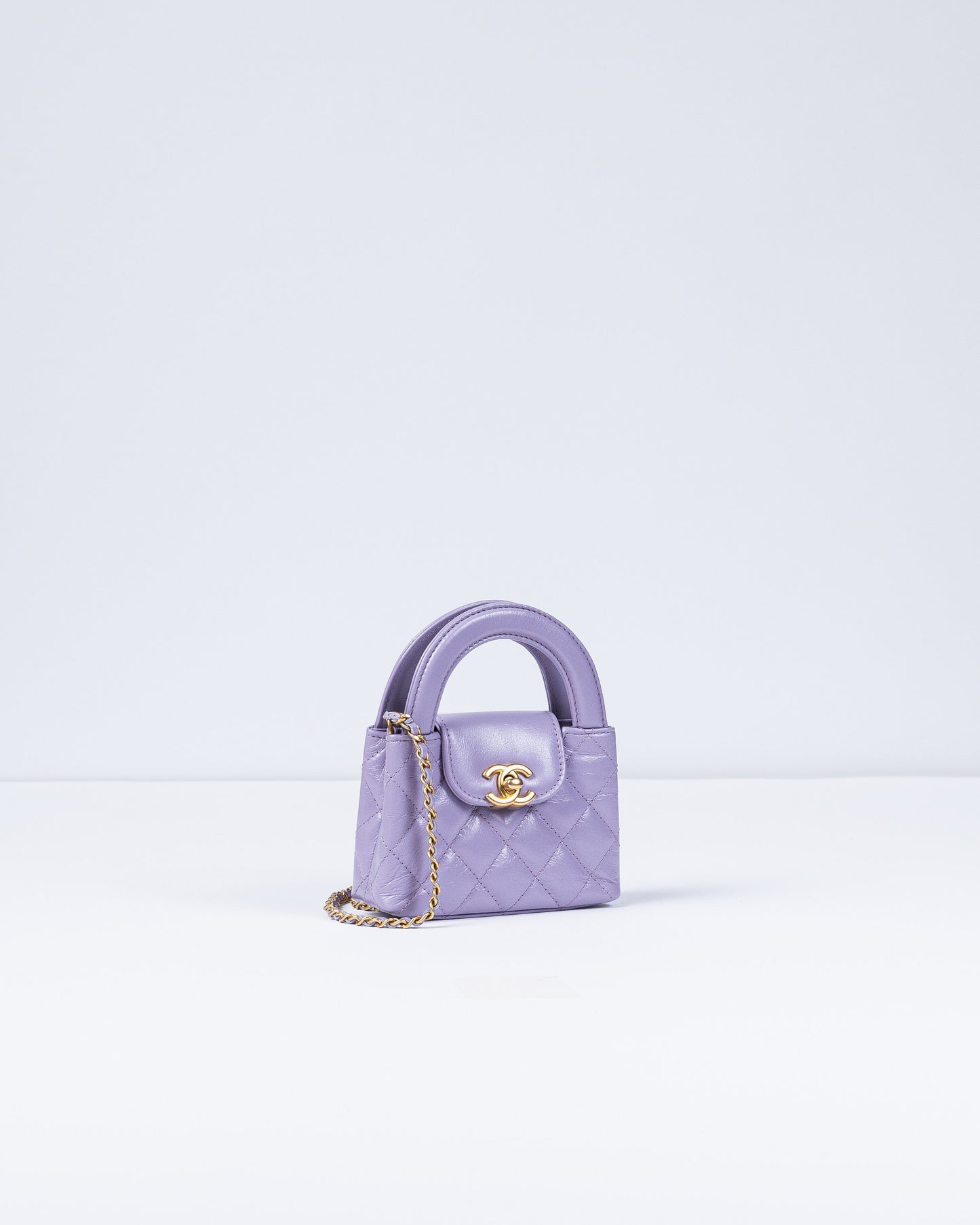 Chanel Kelly Bag Shiny Aged Calfskin & Gold-Tone Metal in Lavender Micro size