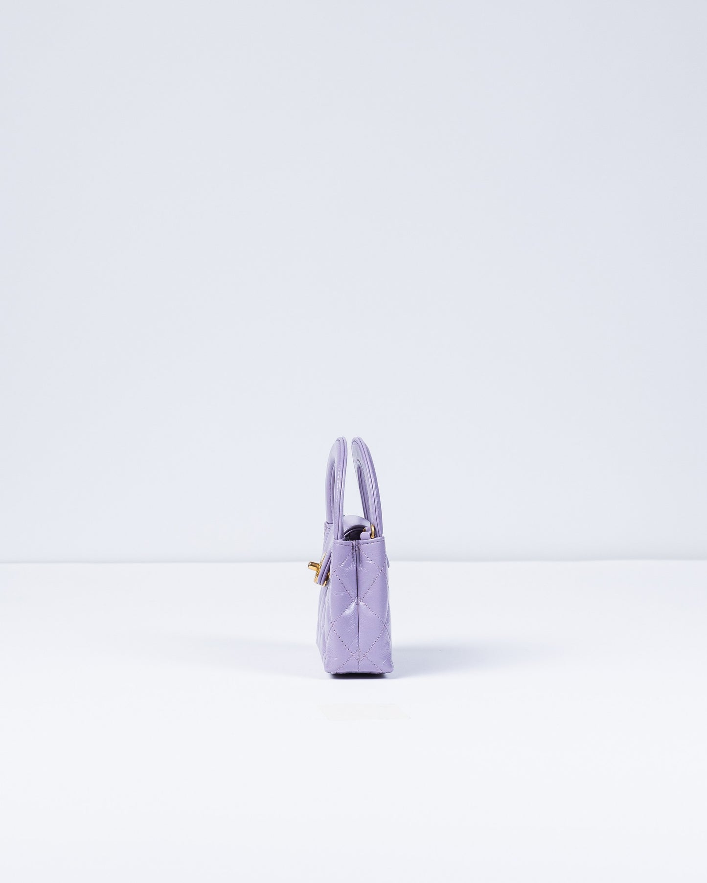 Chanel Kelly Bag Shiny Aged Calfskin & Gold-Tone Metal in Lavender Micro size