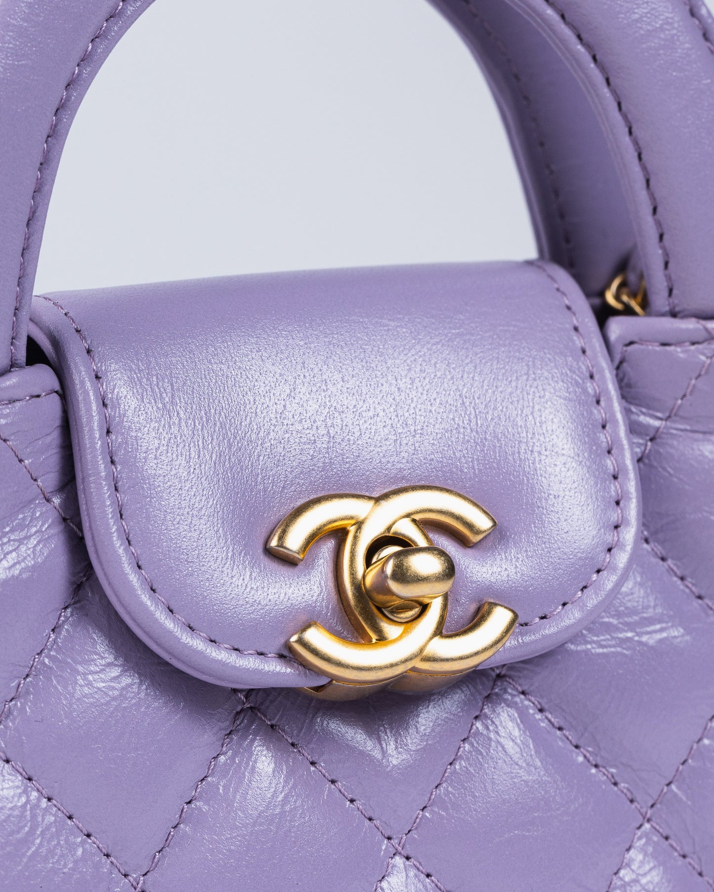 Chanel Kelly Bag Shiny Aged Calfskin & Gold-Tone Metal in Lavender Micro size