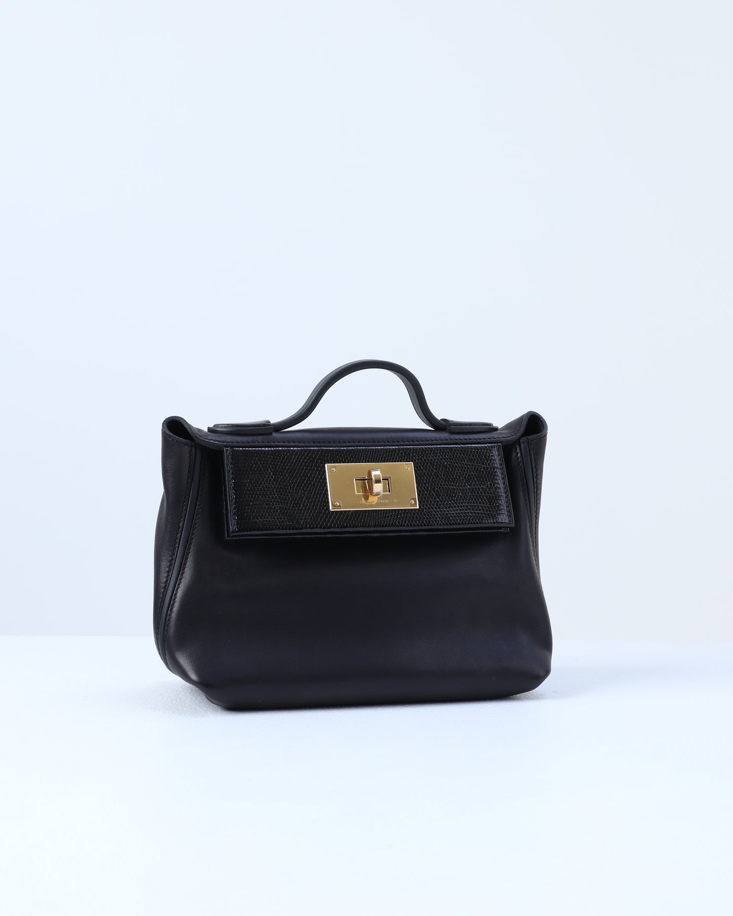 Hermès 24/24 21 Black in Swift Leather with Lizard Touch with Gold Hardware