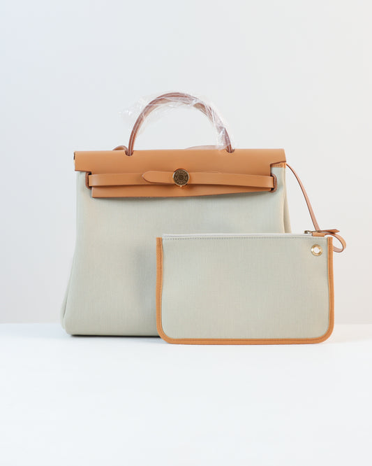 Herbag Zip 31 in Natural Vache Hunter and Beton Toile with Gold Hardware