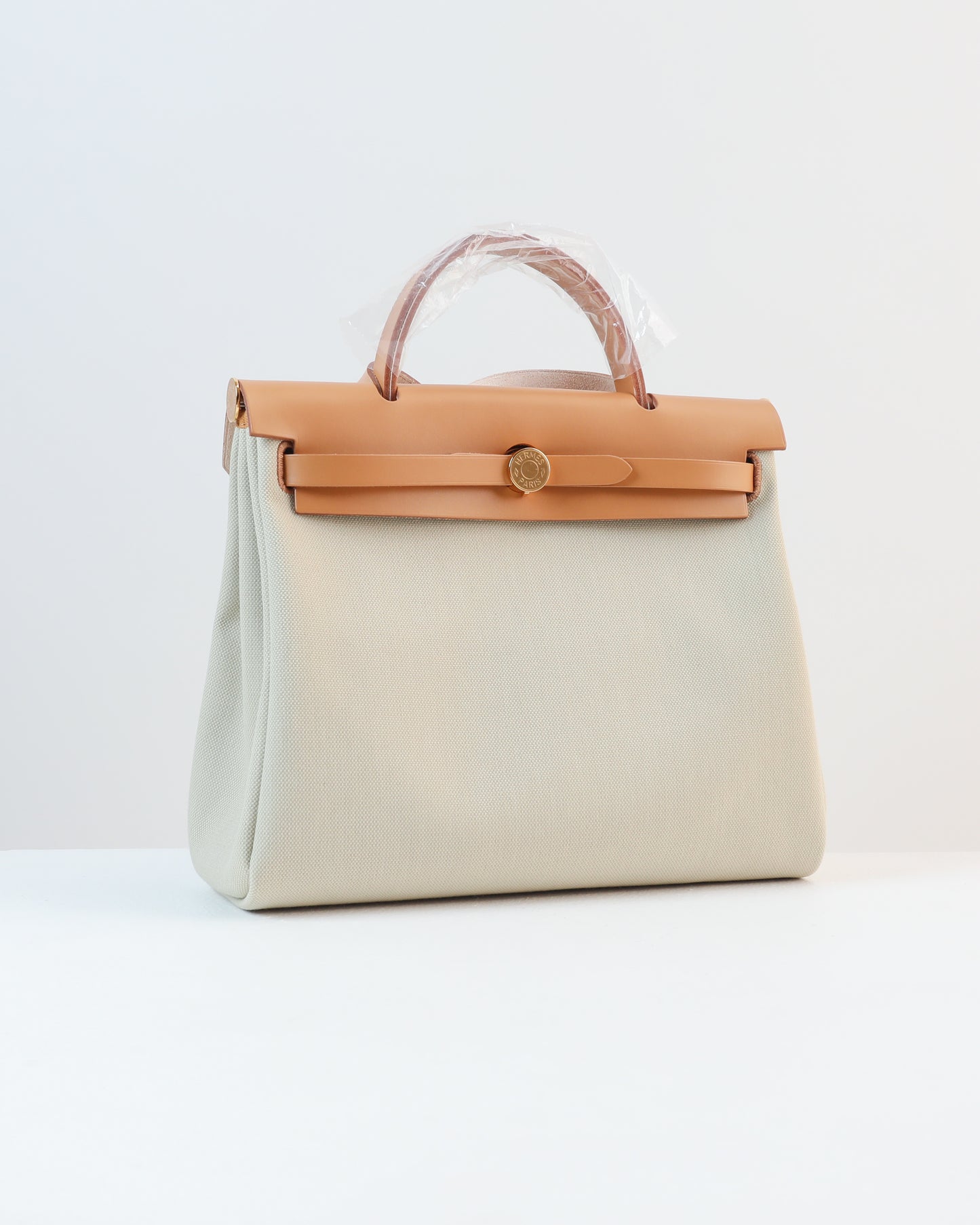 Herbag Zip 31 in Natural Vache Hunter and Beton Toile with Gold Hardware