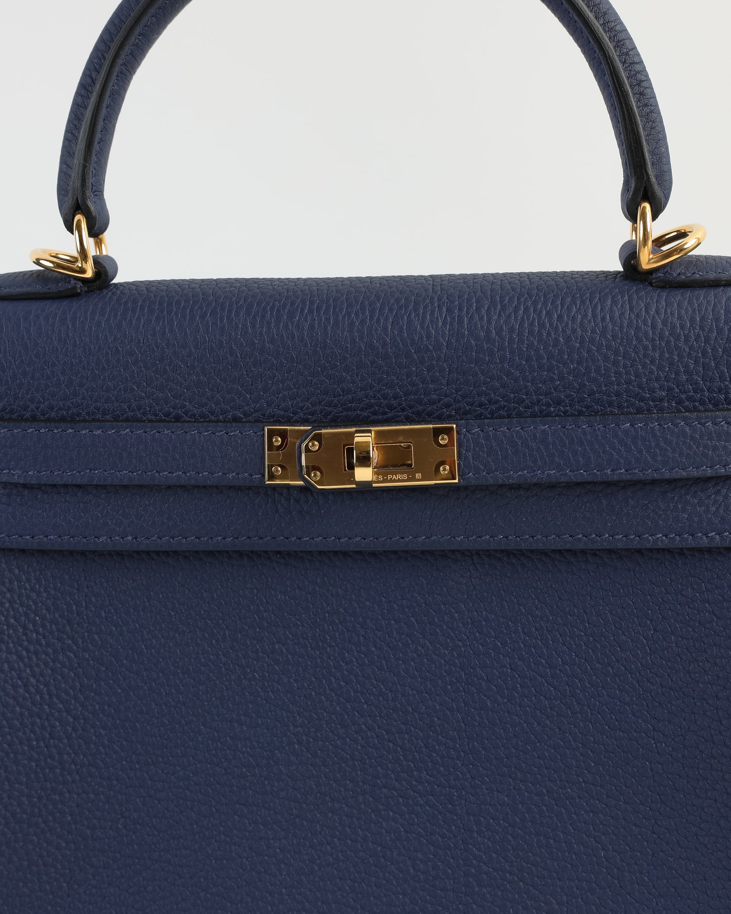 Kelly 25 Bleu Nuit in Togo Leather with Gold Hardware