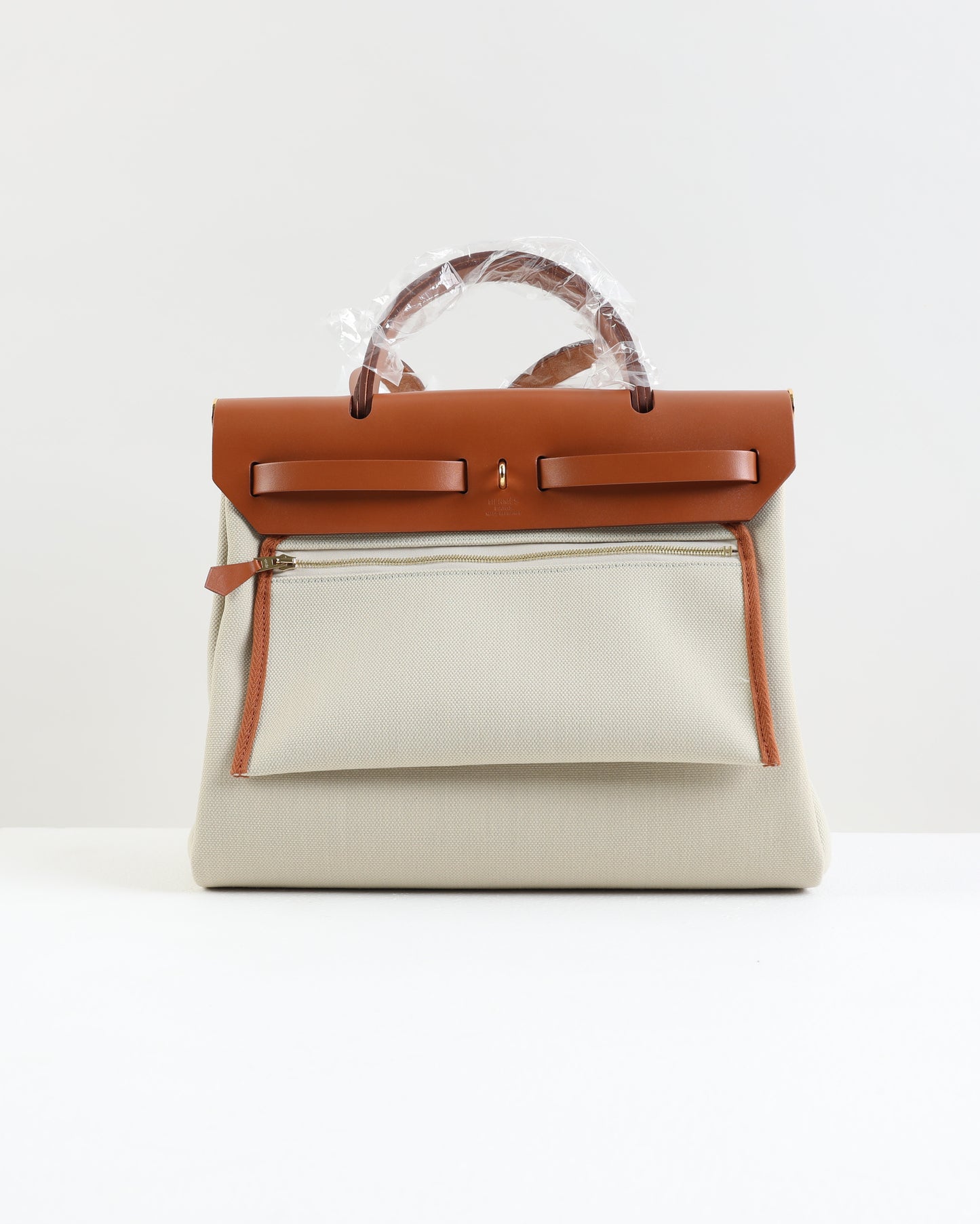 Herbag Zip 31 in Tan Vache Hunter and Beton Toile with Gold Hardware