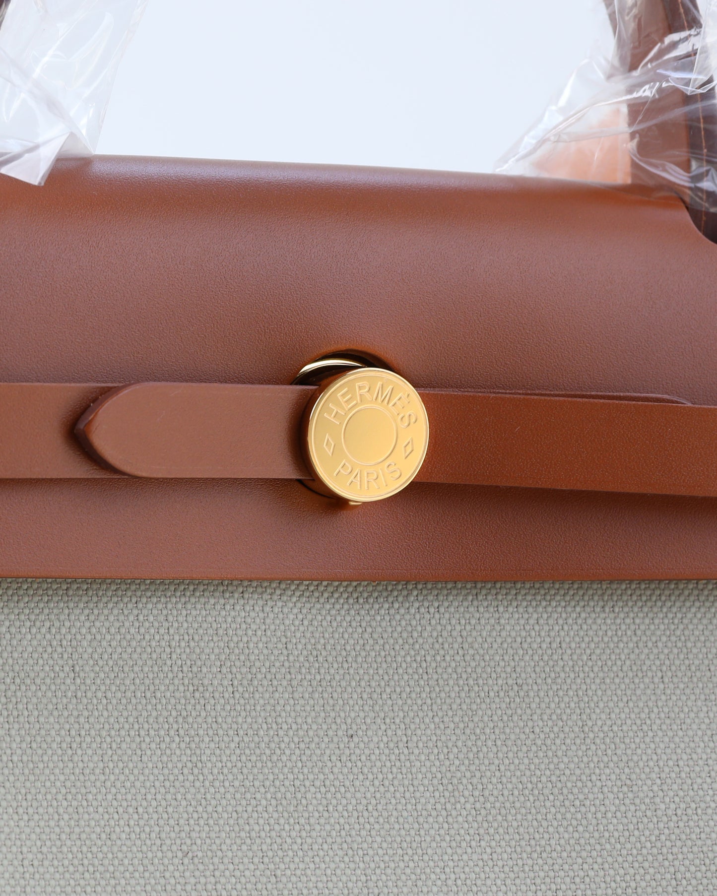 Herbag Zip 31 in Tan Vache Hunter and Beton Toile with Gold Hardware