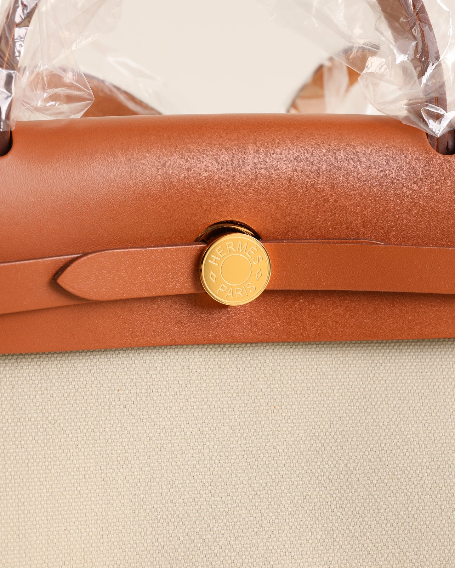 Herbag Zip 31 in Tan Vache Hunter and Beton Toile with Gold Hardware