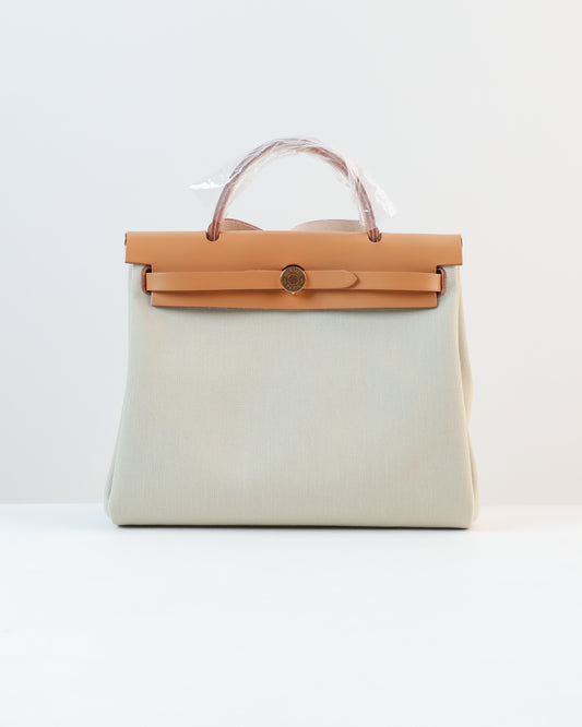 Herbag Zip 31 in Natural Vache Hunter and Beton Toile with Gold Hardware