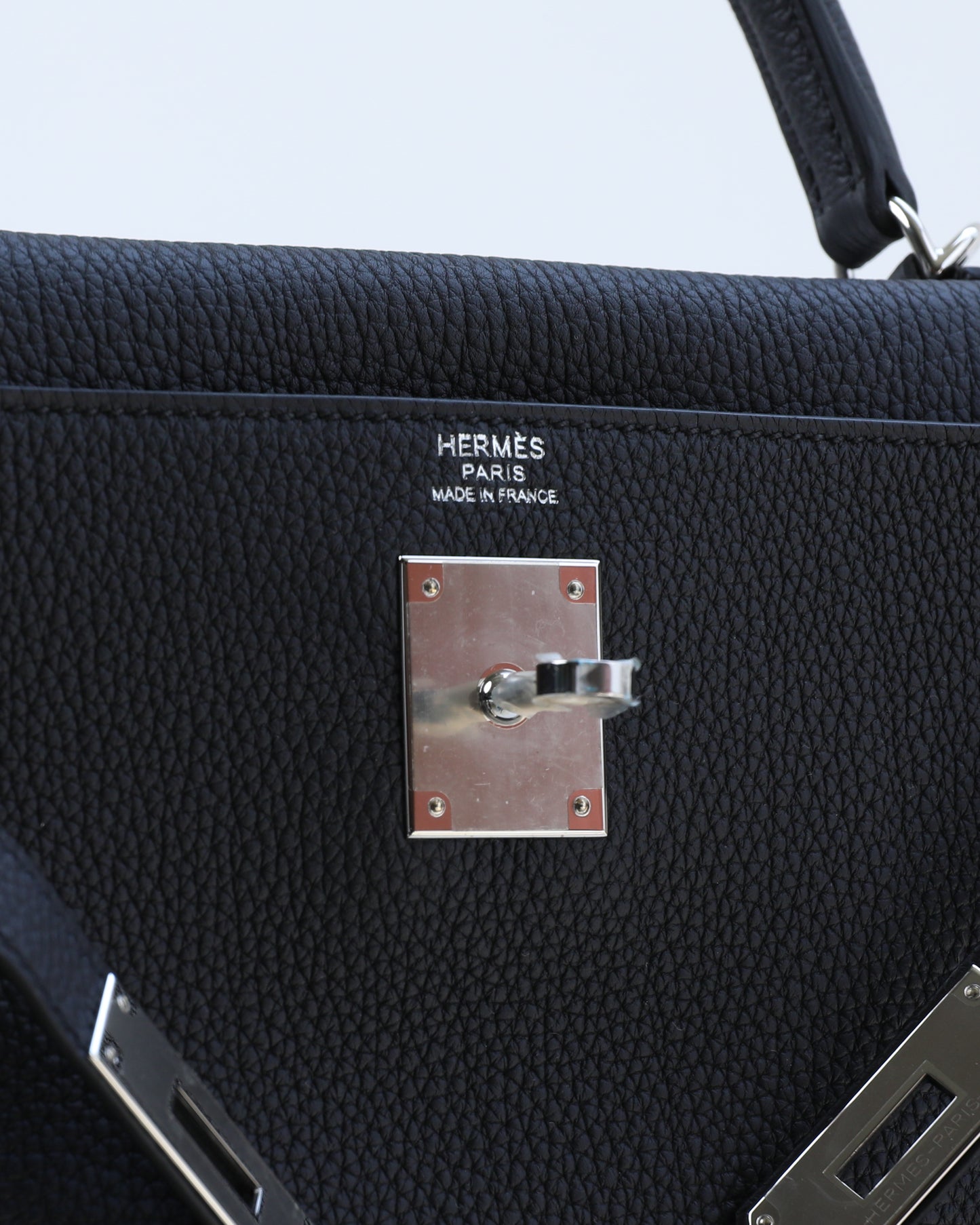 Kelly 32 Retourne Black in Togo Leather with Palladium Hardware