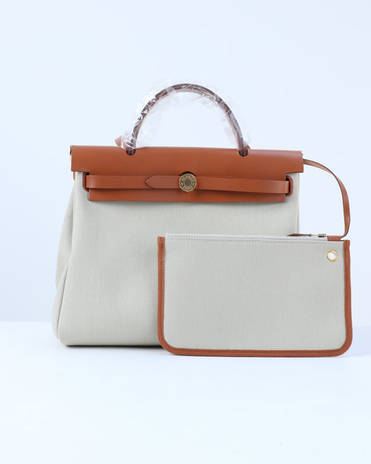 Herbag Zip 31 in Tan Vache Hunter and Beton Toile with Gold Hardware