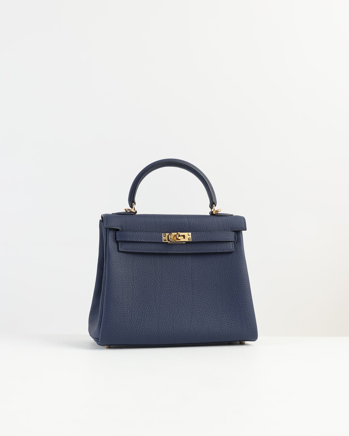 Kelly 25 Bleu Nuit in Togo Leather with Gold Hardware