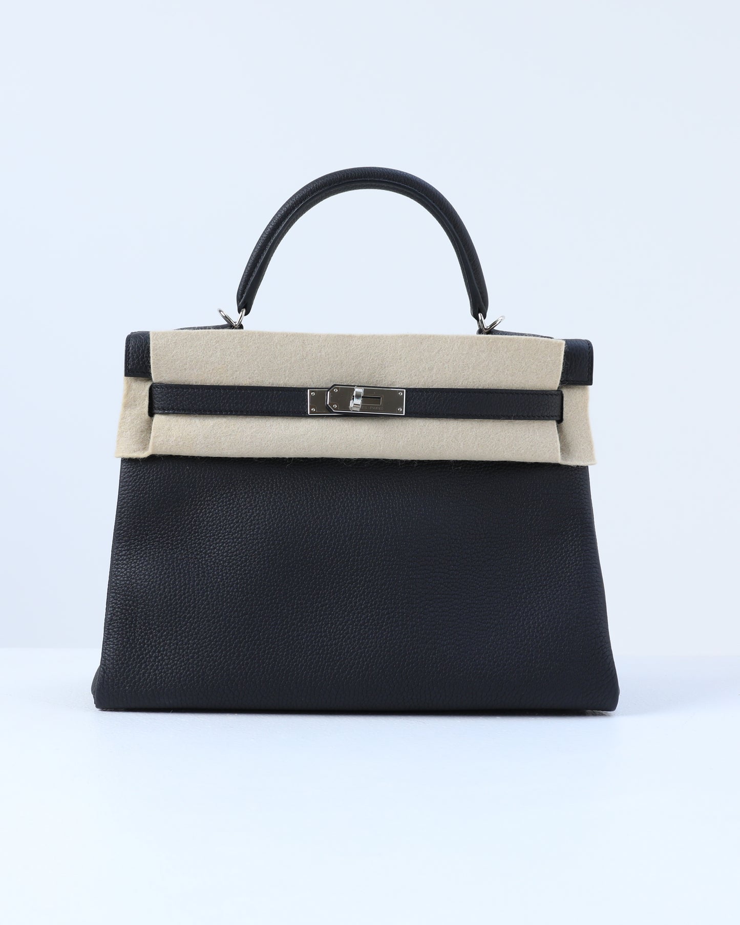 Kelly 32 Retourne Black in Togo Leather with Palladium Hardware