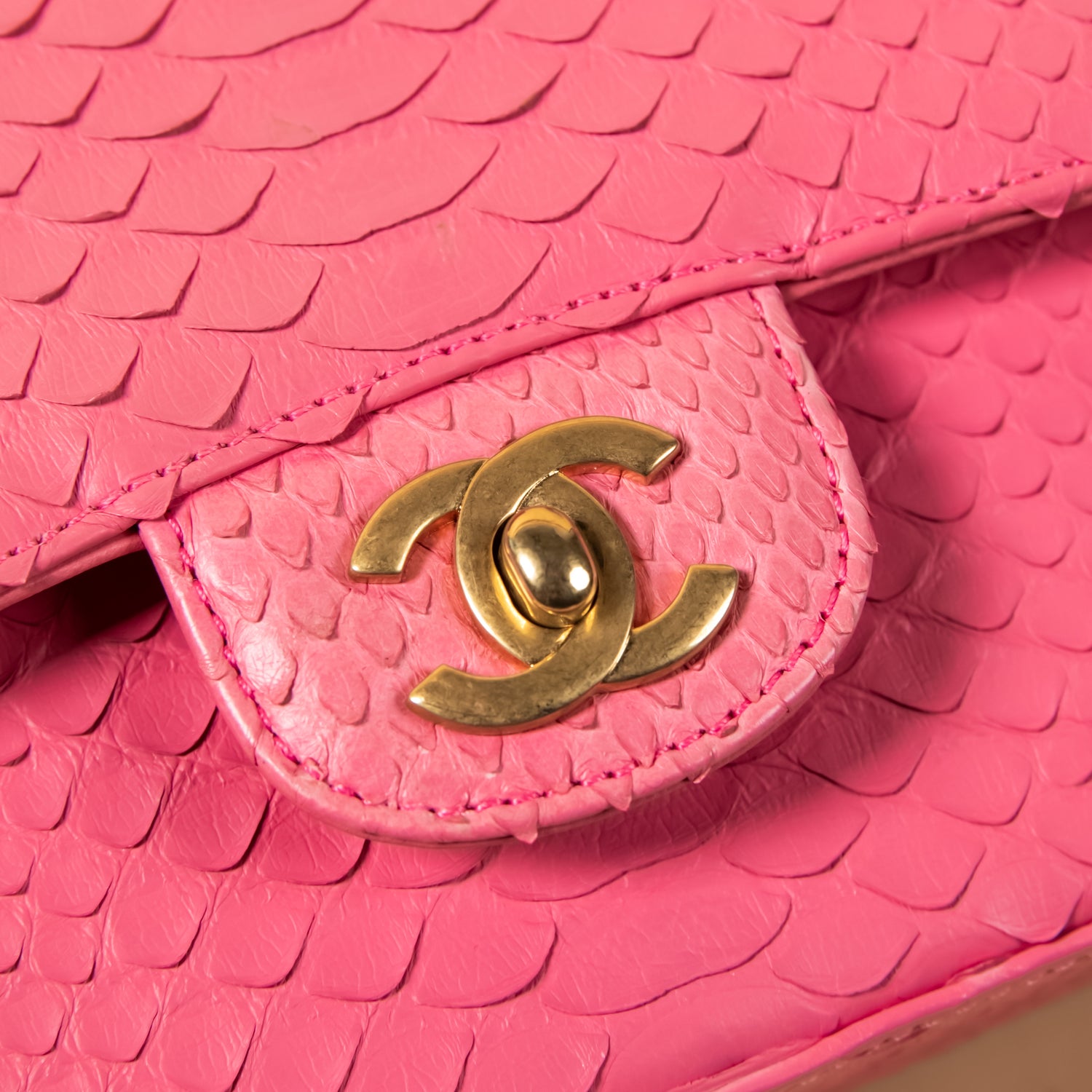 Pink Chanel python leather handbag with gold CC logo