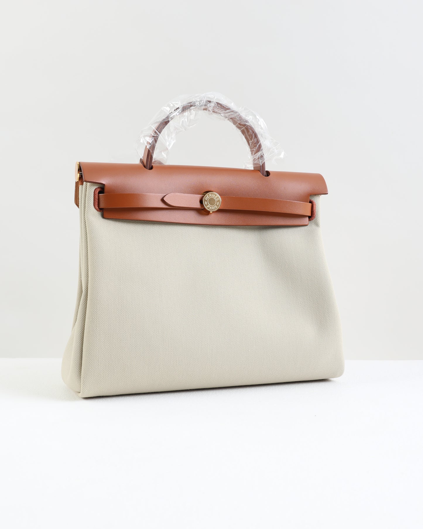 Herbag Zip 31 in Tan Vache Hunter and Beton Toile with Gold Hardware