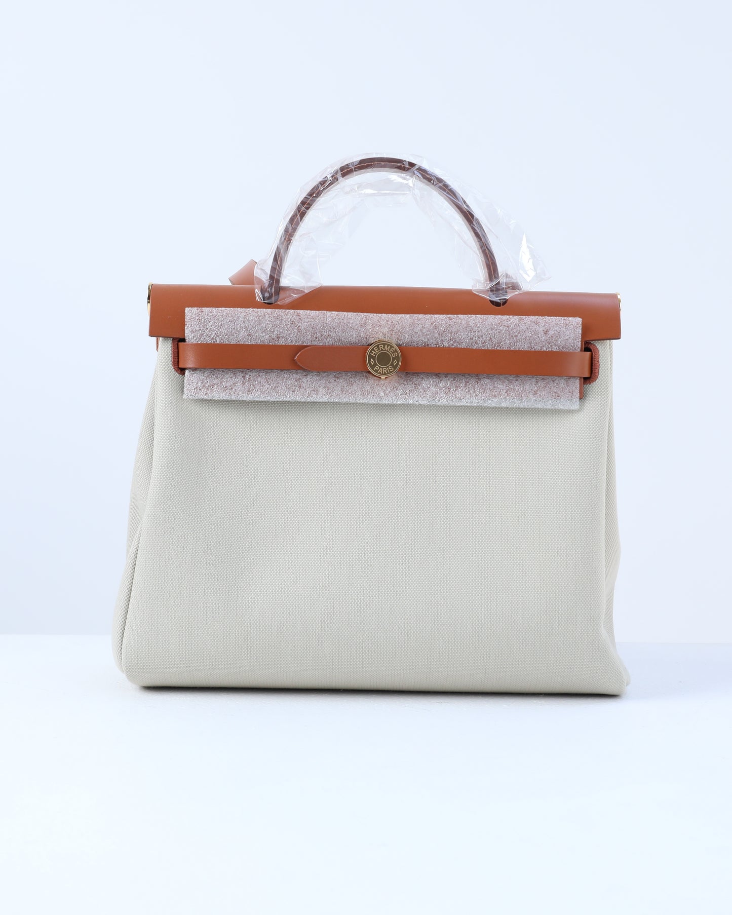 Herbag Zip 31 in Tan Vache Hunter and Beton Toile with Gold Hardware