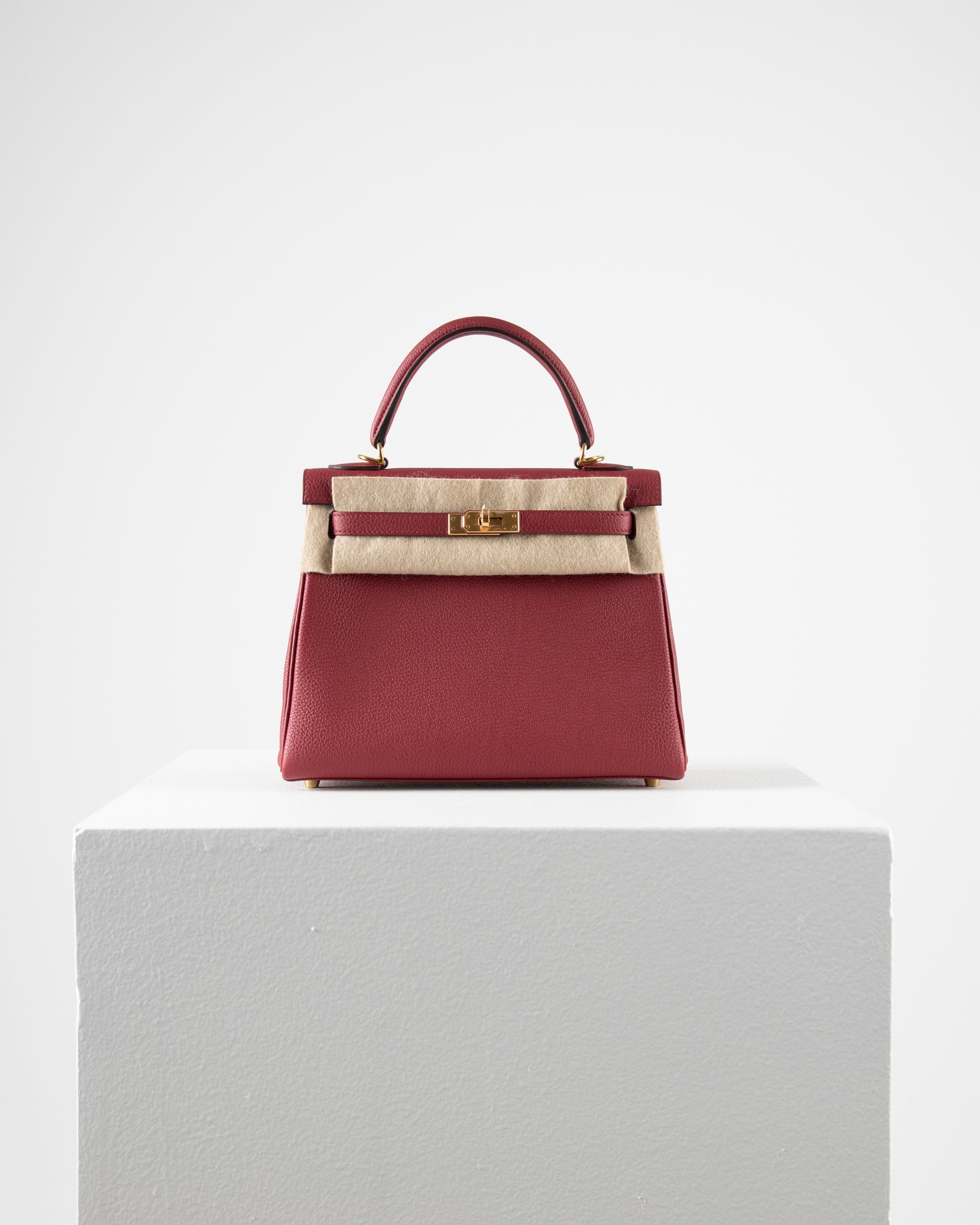 Kelly 25 Rouge Grenat in Togo Leather with Gold Hardware