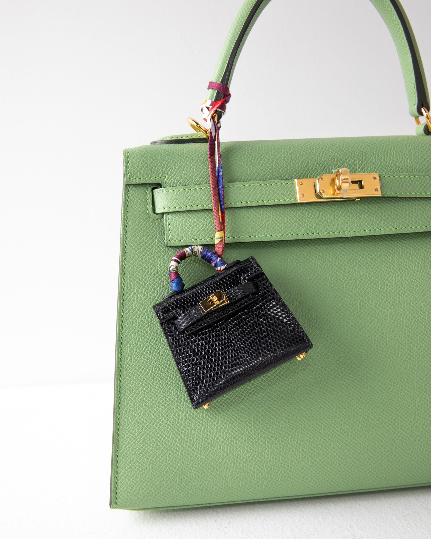 Micro Mini Kelly Twilly Bag Charm in Noir Lizard