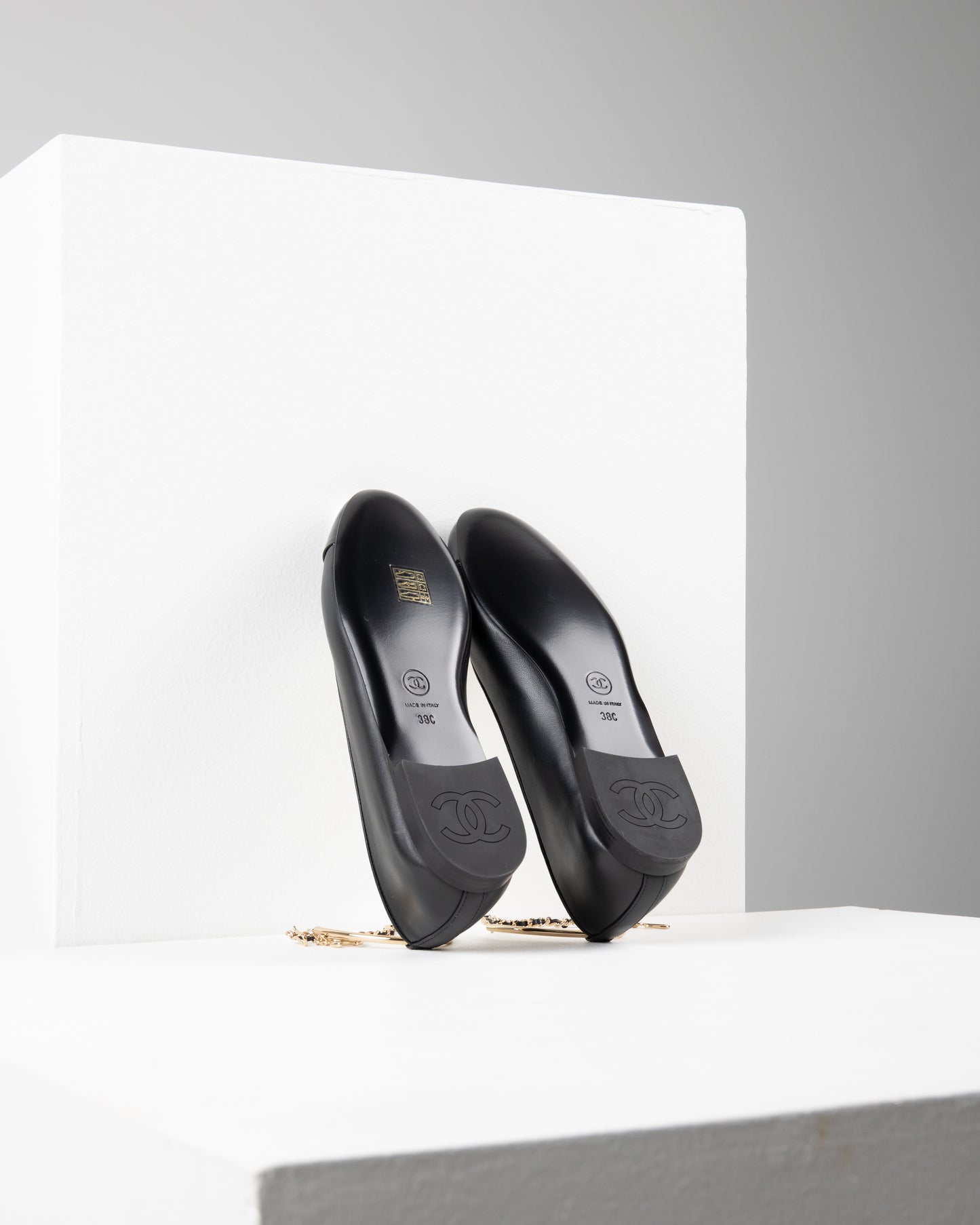 Chanel Ballerina Shoes in Black Leather with Patent Cap Toe and Chain Detail