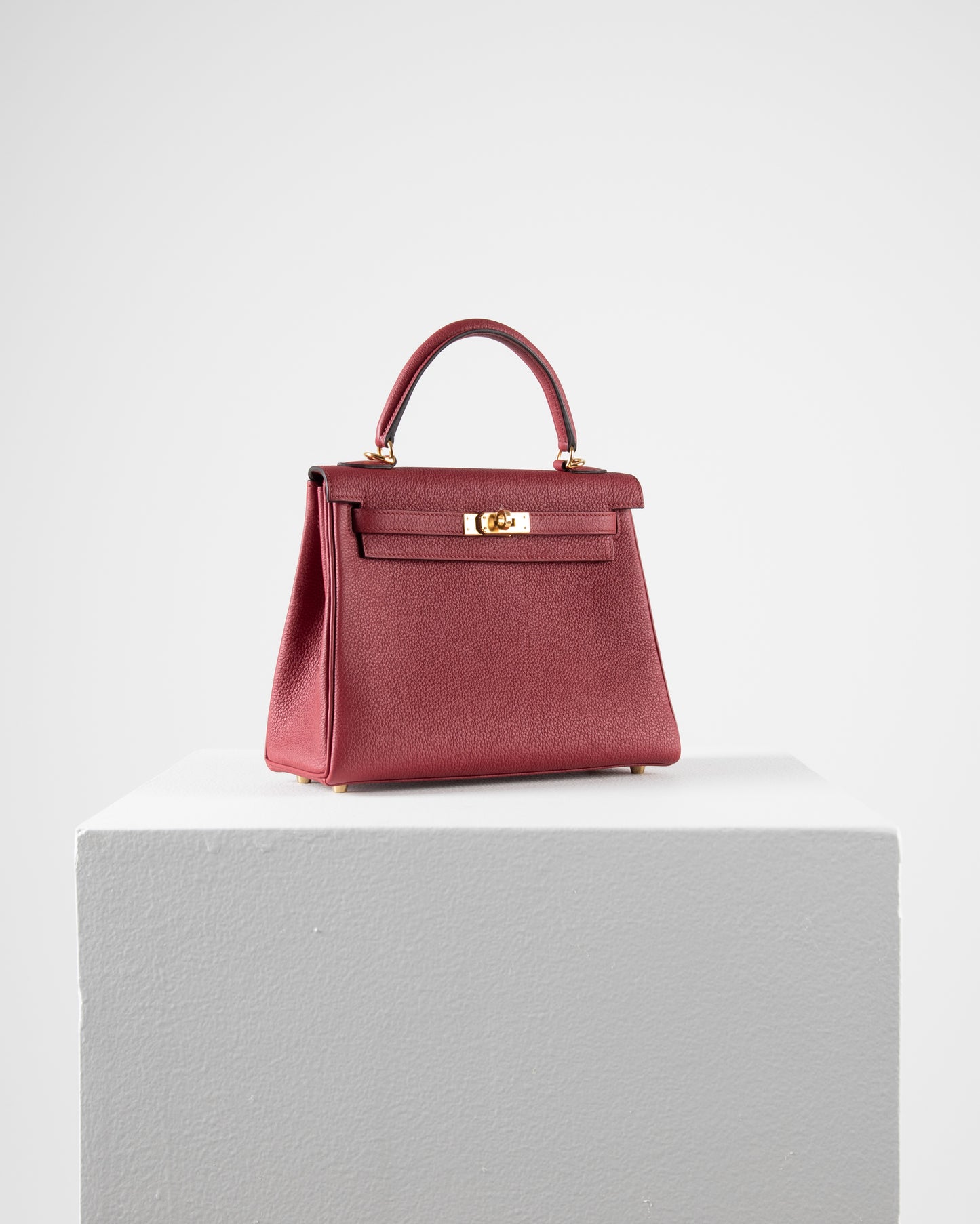 Kelly 25 Rouge Grenat in Togo Leather with Gold Hardware