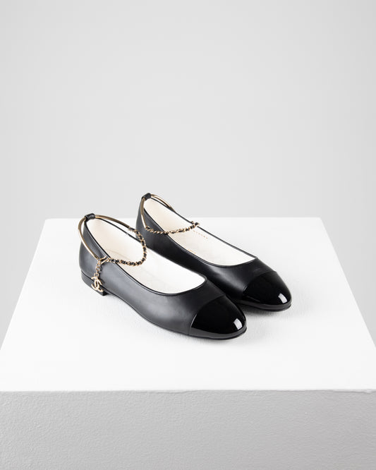Chanel Ballerina Shoes in Black Leather with Patent Cap Toe and Chain Detail
