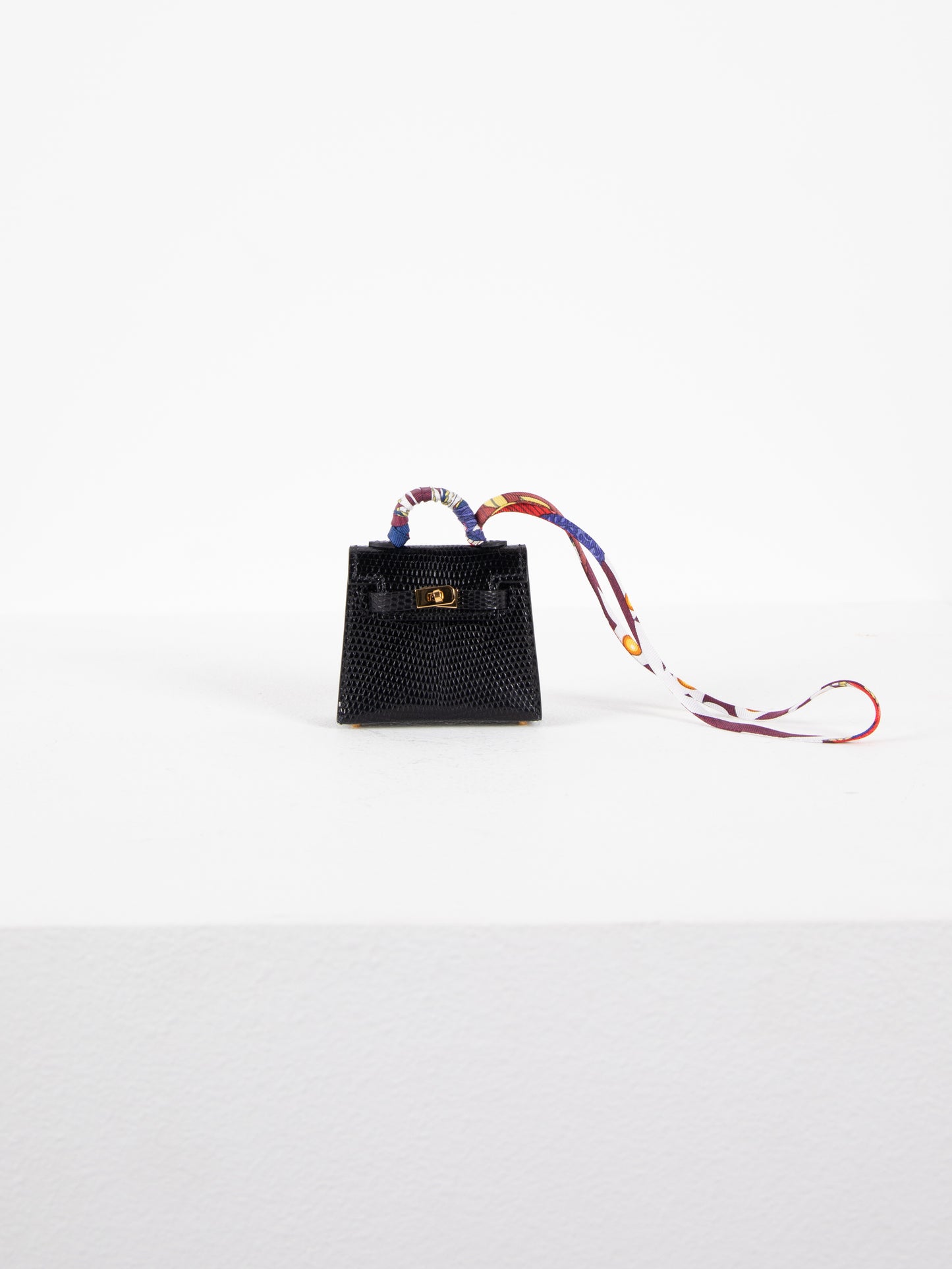 Micro Mini Kelly Twilly Bag Charm in Noir Lizard