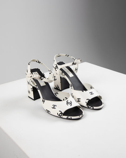 Chanel printed lambskin cc sandals in white