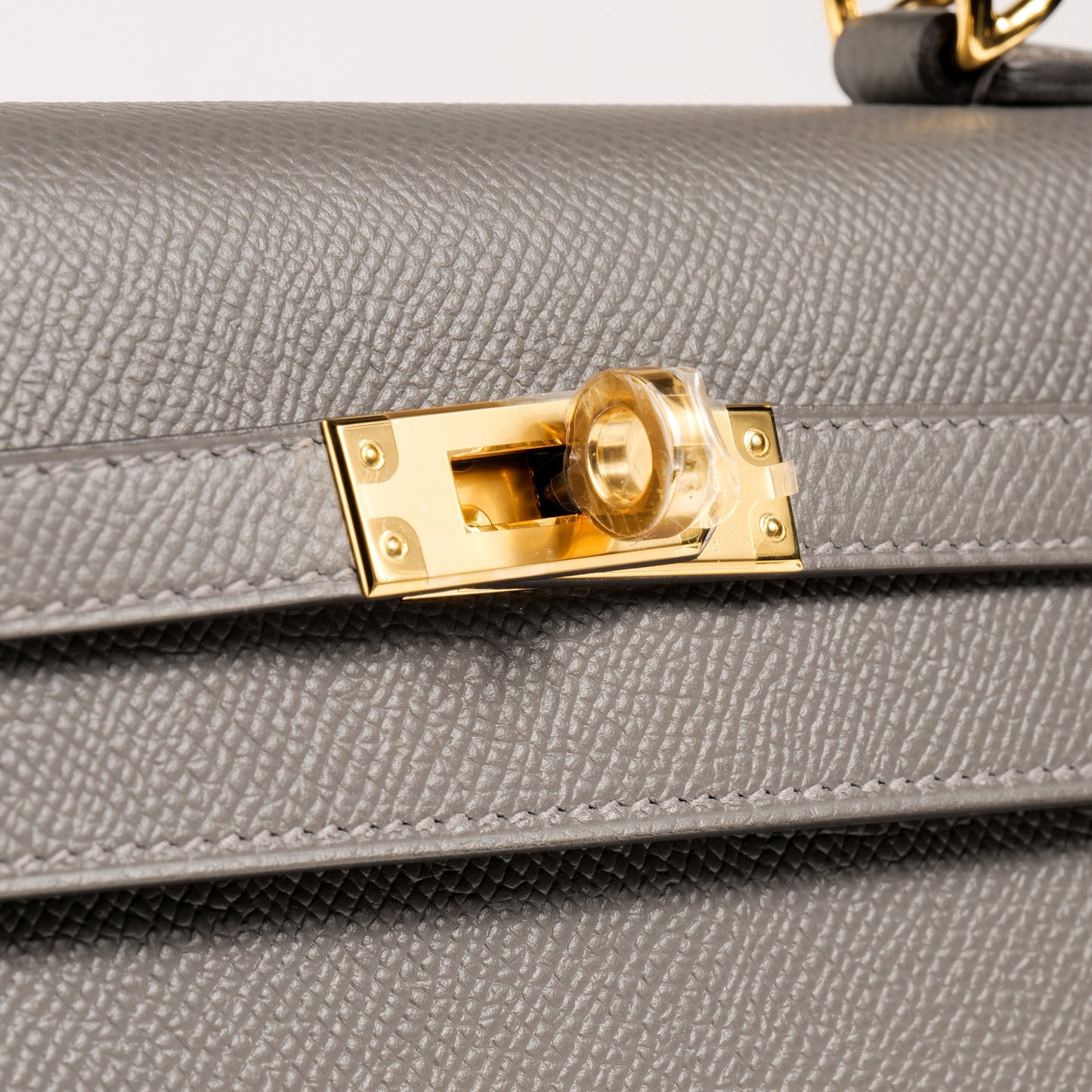 Kelly 25 Gris Meyer with Gold Hardware