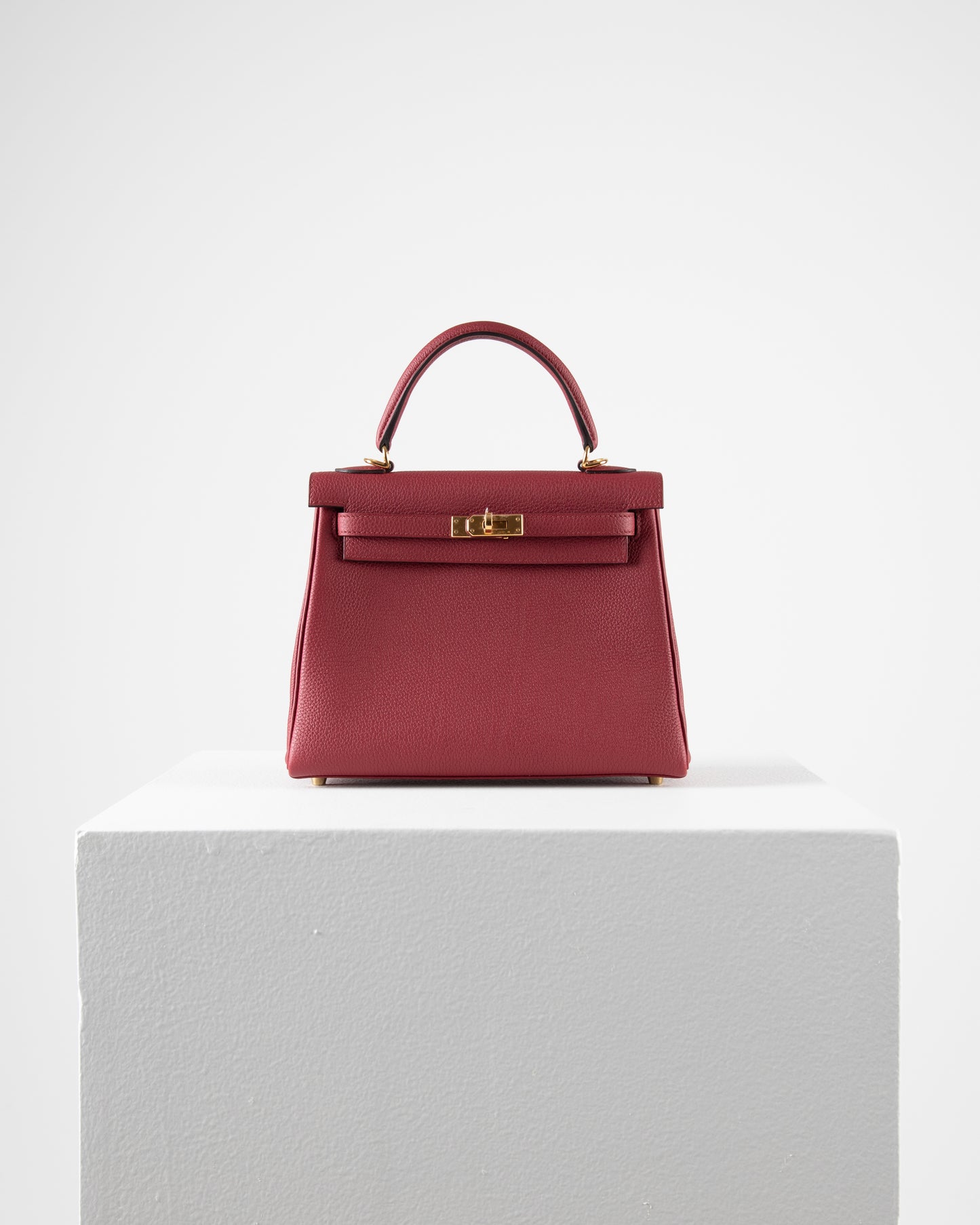 Kelly 25 Rouge Grenat in Togo Leather with Gold Hardware
