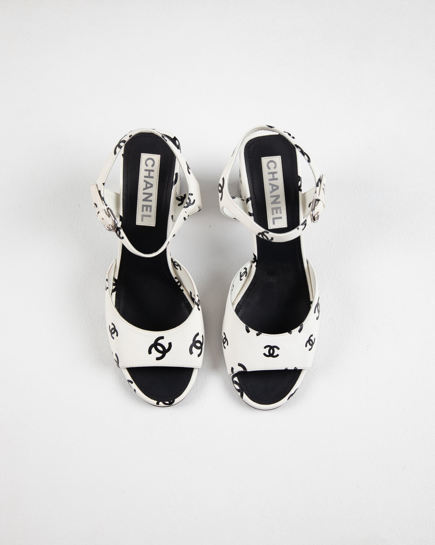 Chanel printed lambskin cc sandals in white