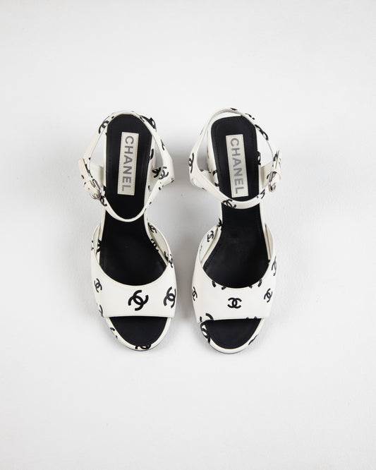Chanel printed lambskin cc sandals in white