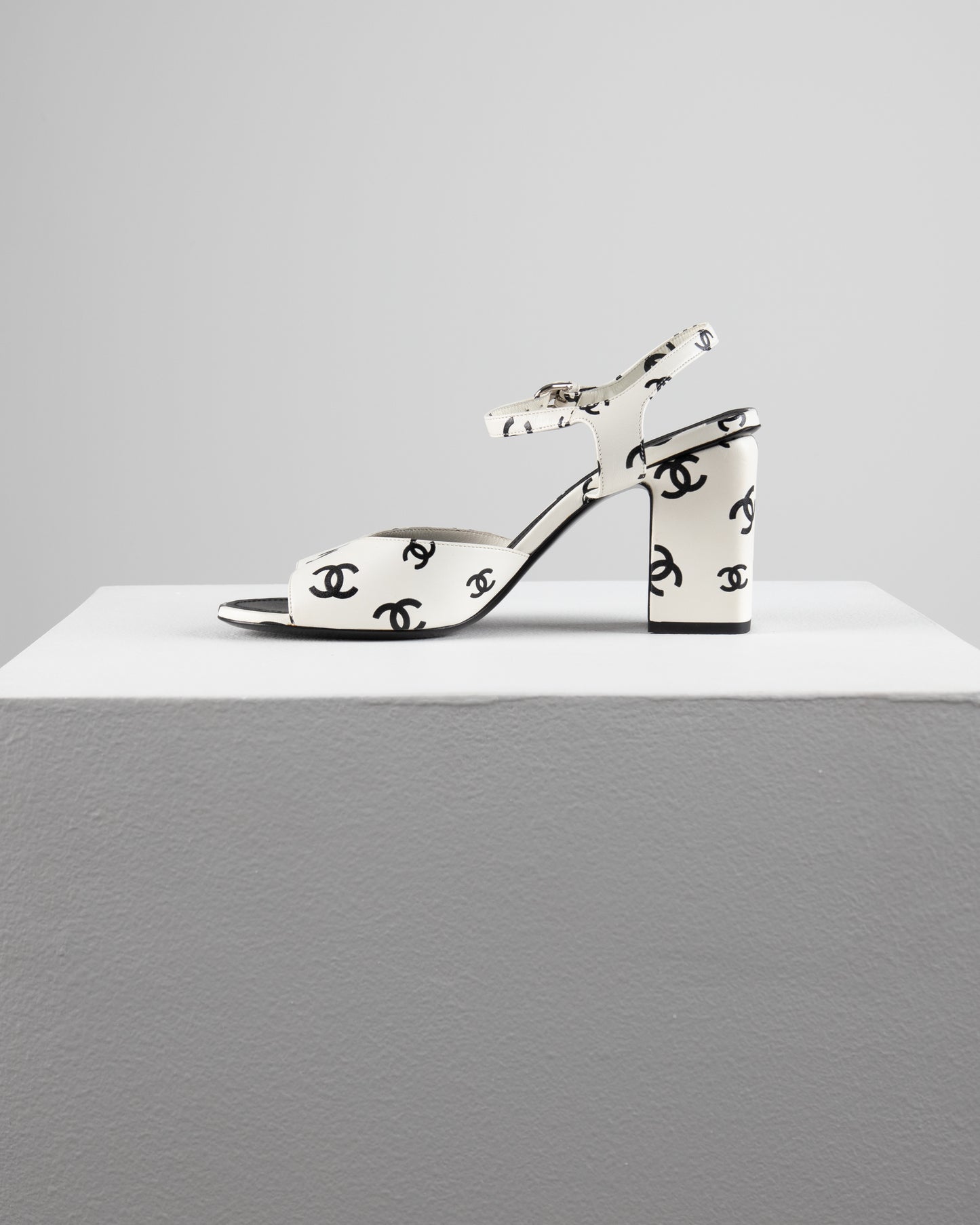 Chanel printed lambskin cc sandals in white