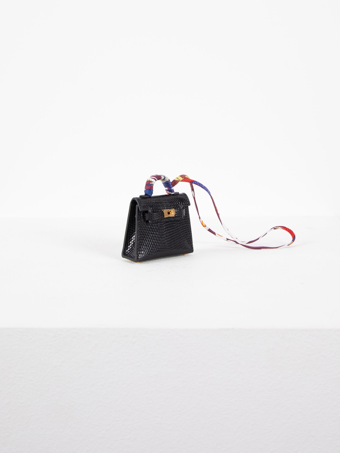 Micro Mini Kelly Twilly Bag Charm in Noir Lizard