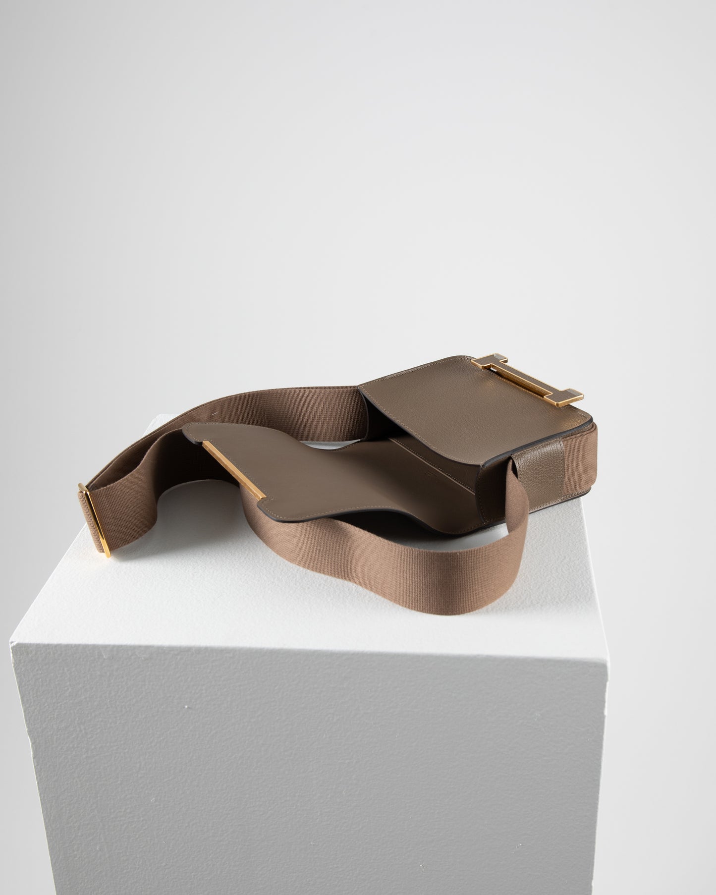 Geta Etoupe in Mysore Goatskin with Canvas Strap and Etoupe/Gold H Buckle