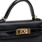 Kelly 20 Black in Veau Madame Leather and Alligator Touch with Gold Hardware