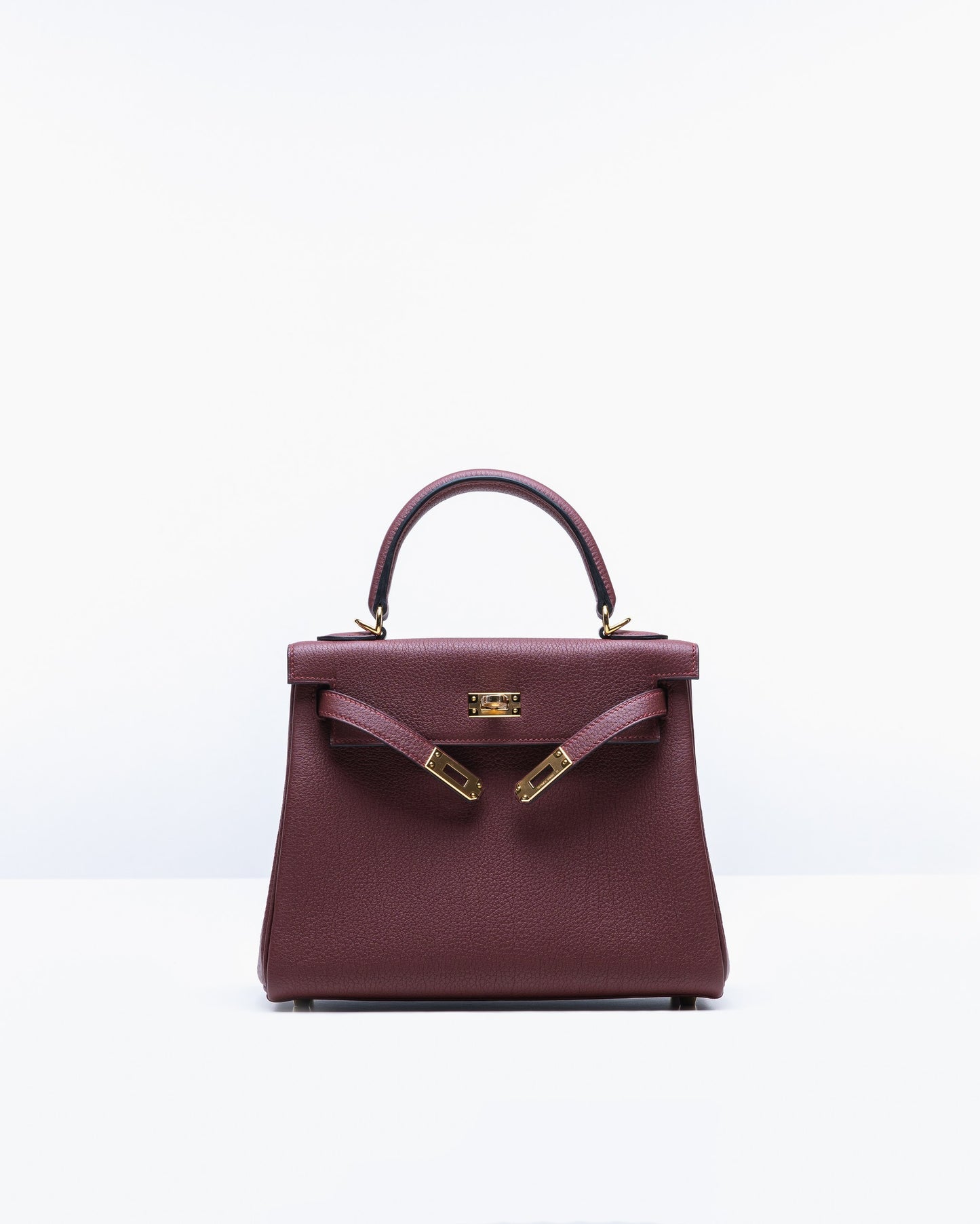 Kelly 25 Rouge H in Togo leather with Gold Hardware