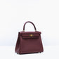 Kelly 25 Rouge H in Togo leather with Gold Hardware