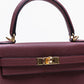 Kelly 25 Rouge H in Togo leather with Gold Hardware