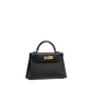 Kelly 20 Sellier Black in Madame Touch Alligator with Gold Hardware