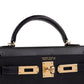 Kelly 20 Sellier Black in Madame Touch Alligator with Gold Hardware