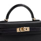 Kelly 20 Sellier Black in Madame Touch Alligator with Gold Hardware
