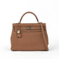 Kelly 32 Gold Togo with Palladium Hardware