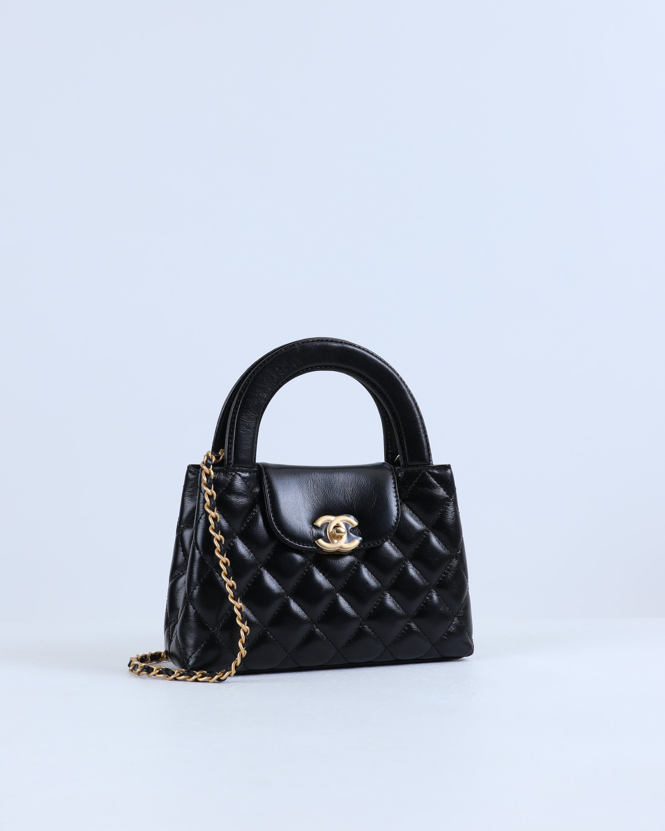 Chanel Kelly Bag Shiny Aged Calfskin Gold Tone Metal in Black