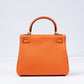 Kelly 25 Orange in Togo Leather with Gold Hardware