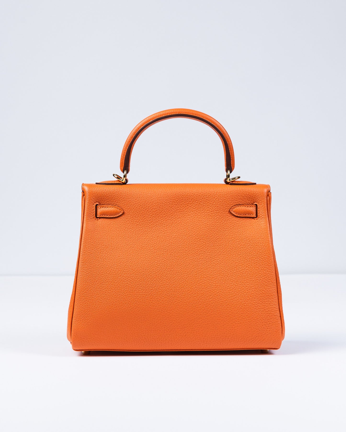 Kelly 25 Orange in Togo Leather with Gold Hardware