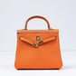 Kelly 25 Orange in Togo Leather with Gold Hardware
