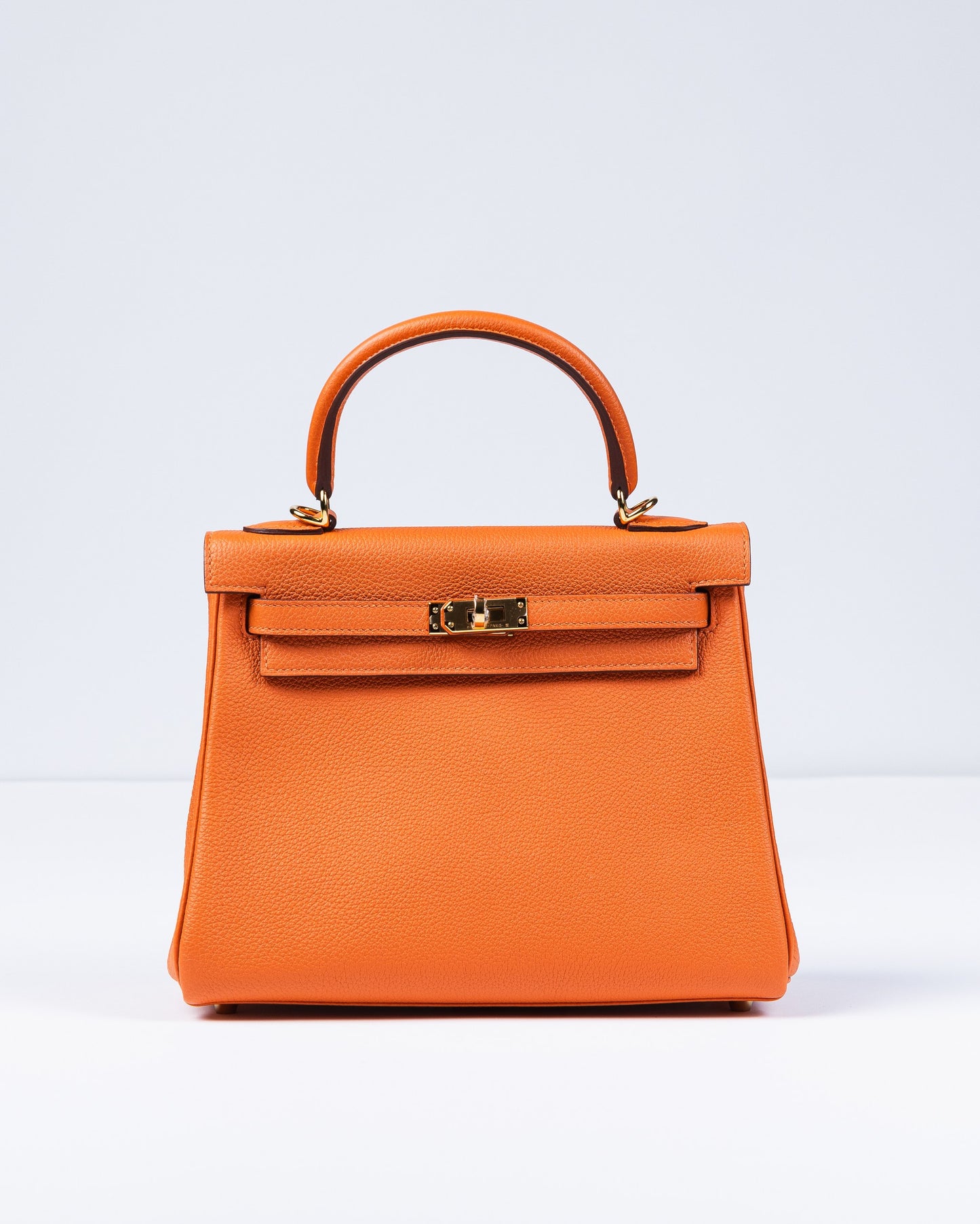 Kelly 25 Orange in Togo Leather with Gold Hardware