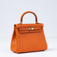 Kelly 25 Orange in Togo Leather with Gold Hardware